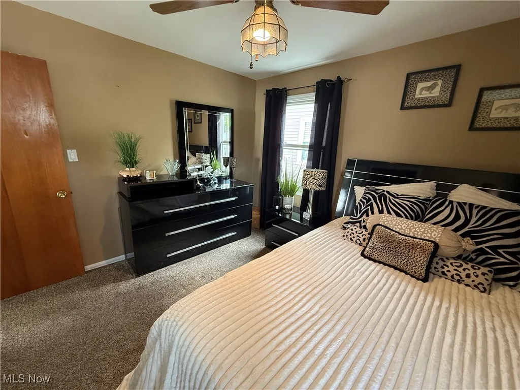 Bedroom with carpet