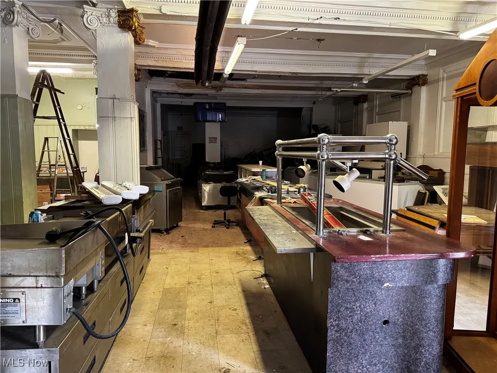 Basement featuring light floors