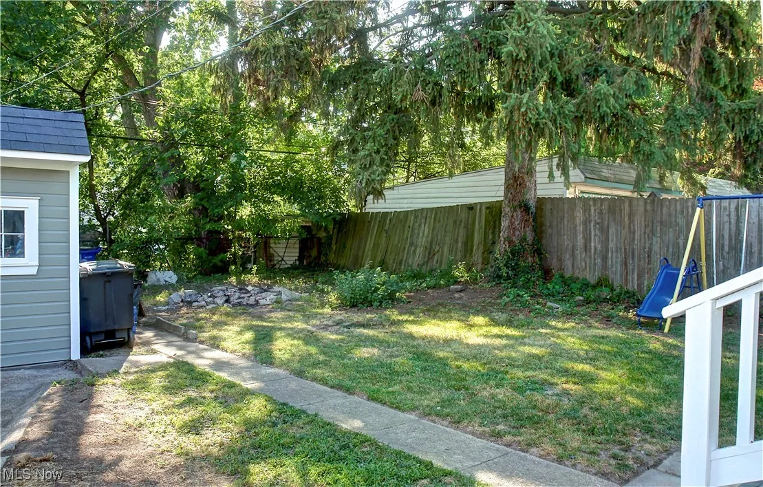 View of fenced backyard