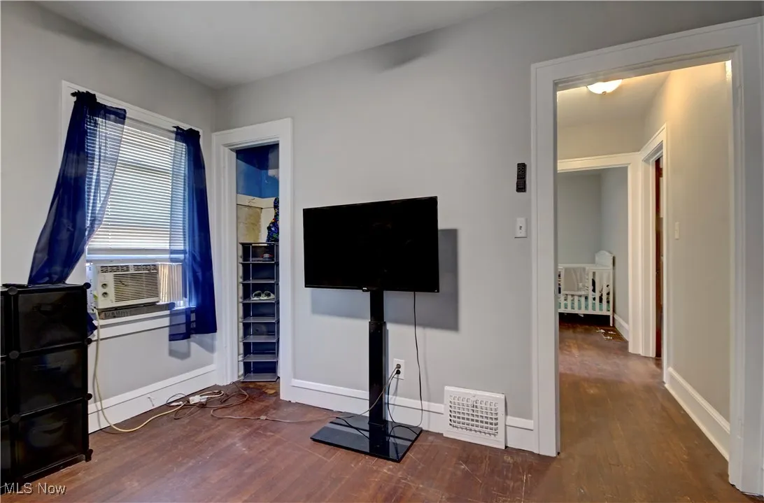 Exercise room with wood finished floors