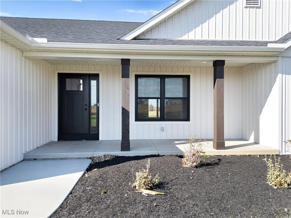 Property entrance with a porch