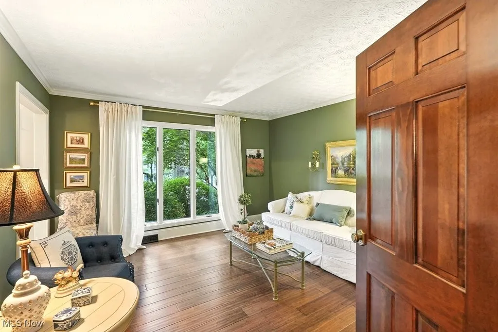 Living Room with Bamboo Flooring and Extra Wide Baseboards