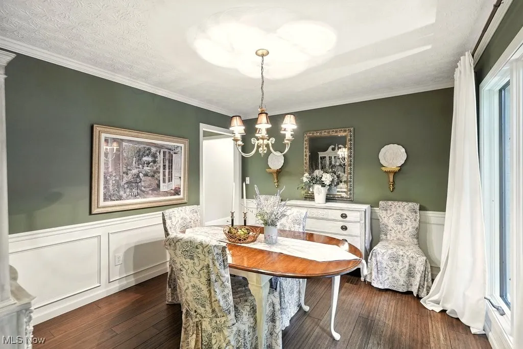 Dining Room with Bamboo Flooring and Bay Window