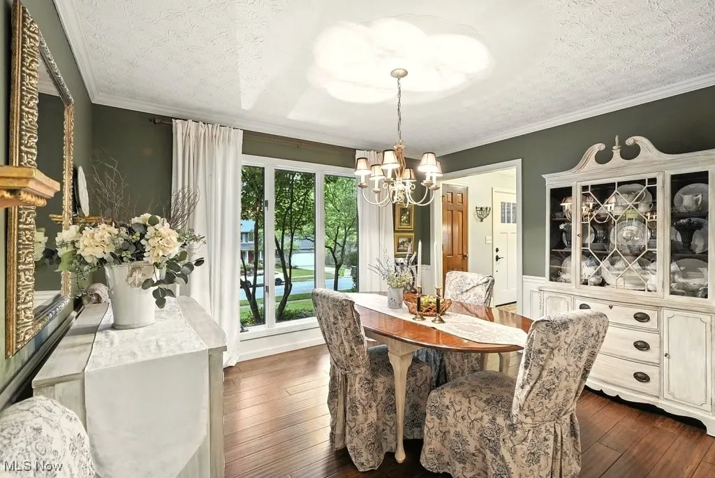 Dining Room with Bamboo Flooring and Bay Window