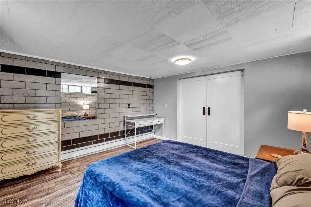 Bedroom featuring wood finished floors
