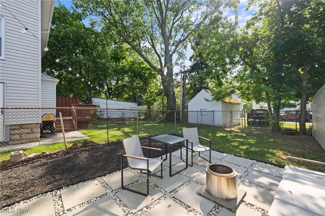 Fenced backyard featuring a patio