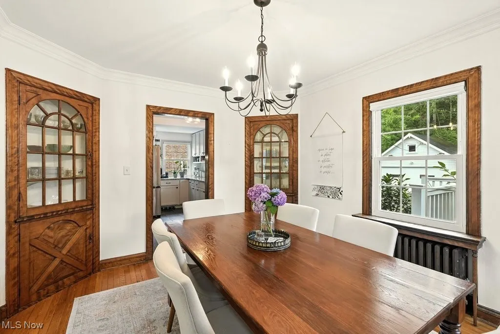 Dining room with views into kitchen and back deck
