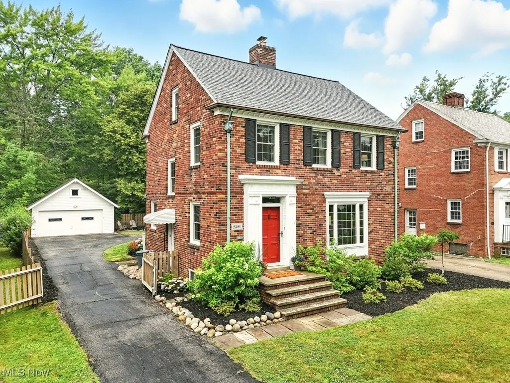 Brick home, beautifully landscaped, new roof
