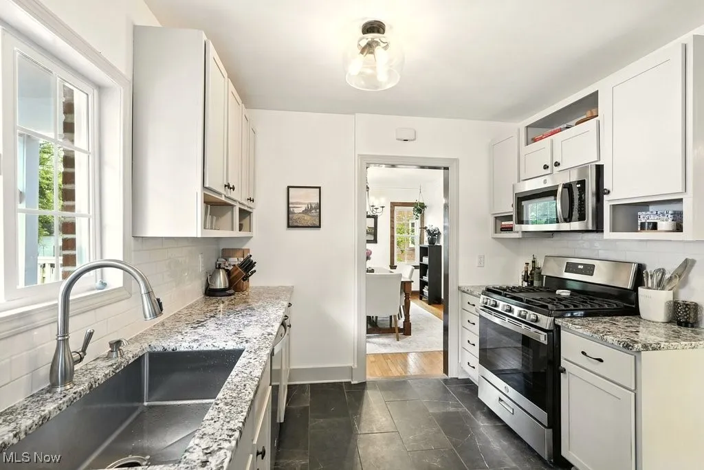View of kitchen, loads of countertop space