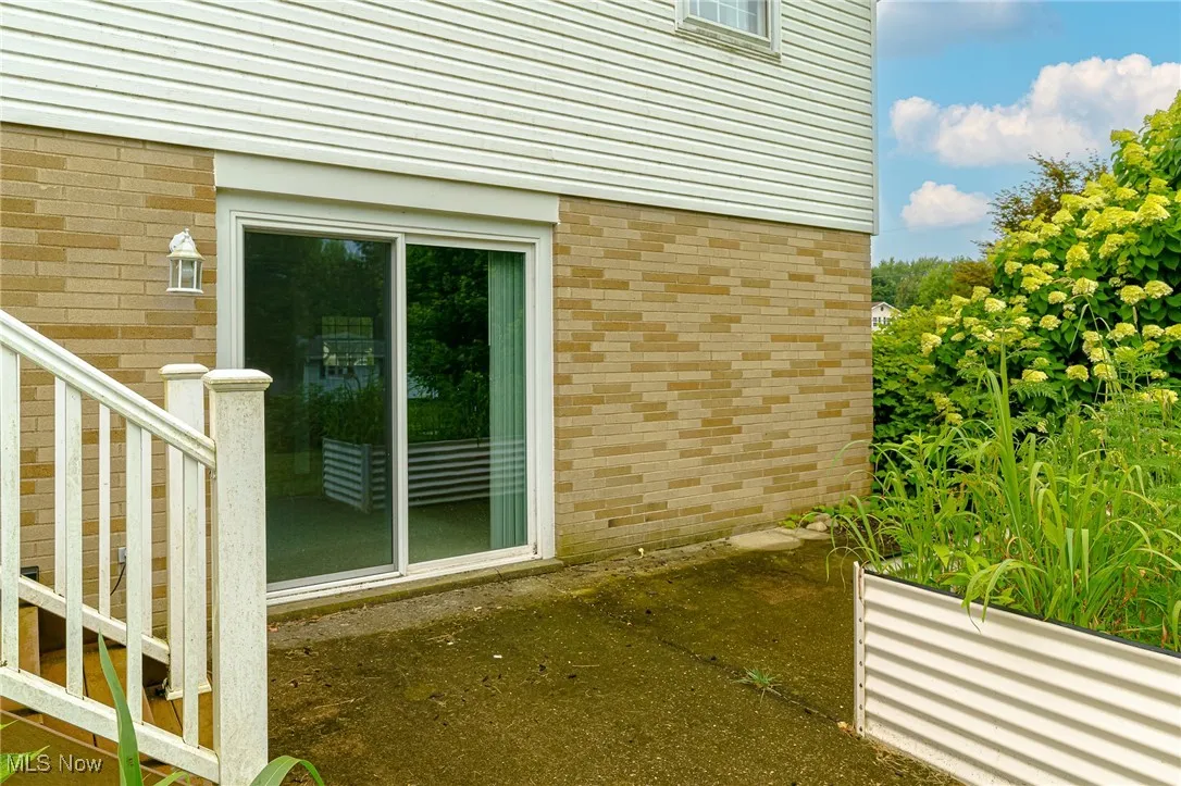 Patio can be accessed from the deck or through the slider doors from the family room