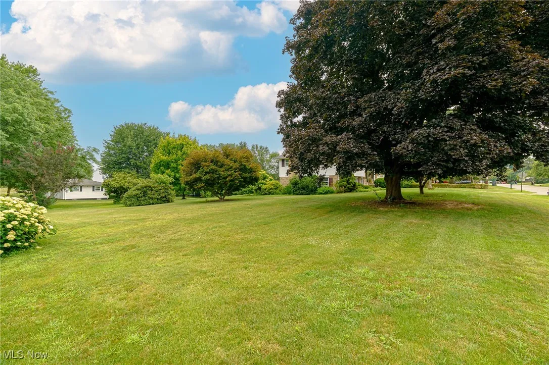 Additional lot is almost a half acre.  Great space to build another family home or to add a pool.