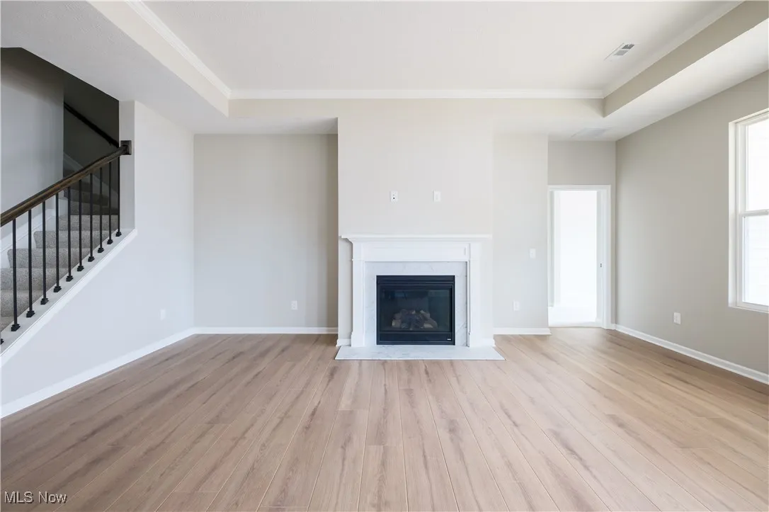 Gas fireplace creates a focal point of the living room.
