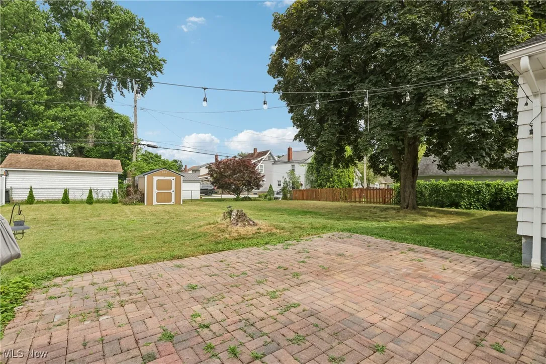 View of patio / terrace with a storage shed