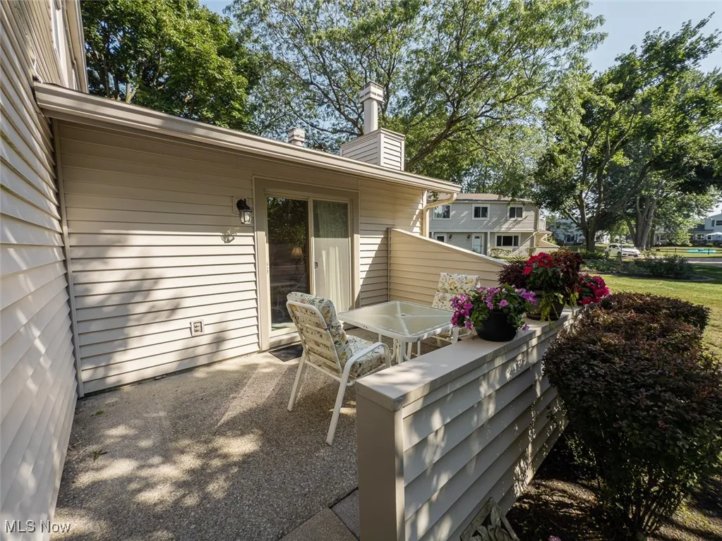 View of patio with outdoor dining area