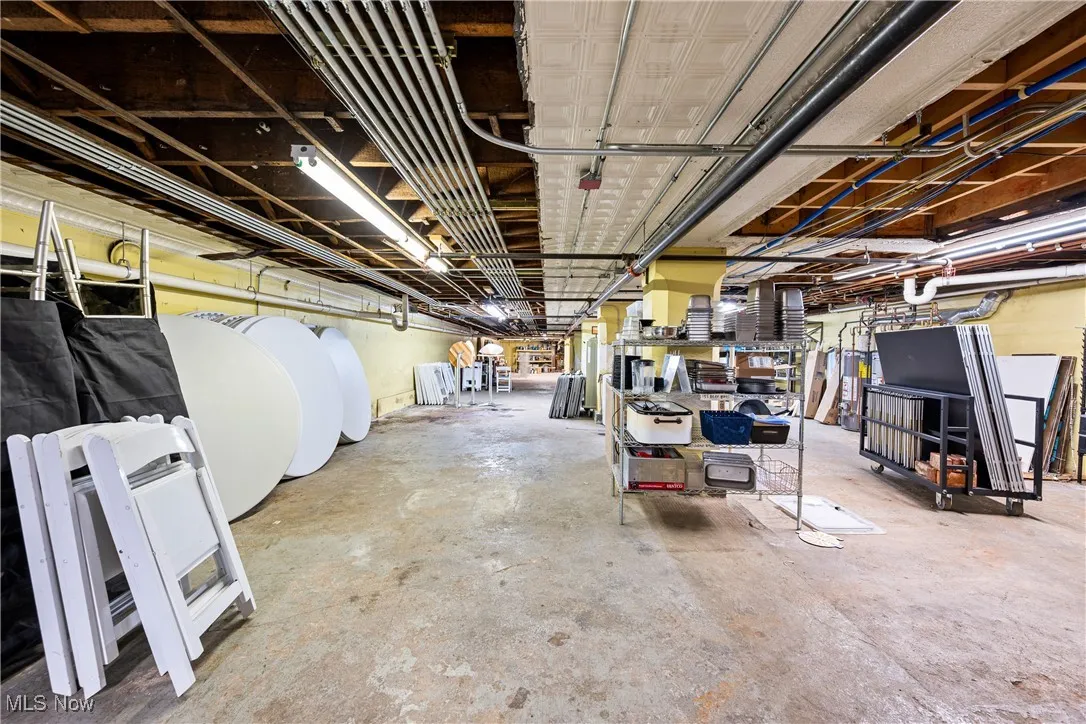 Unfinished basement with gas water heater