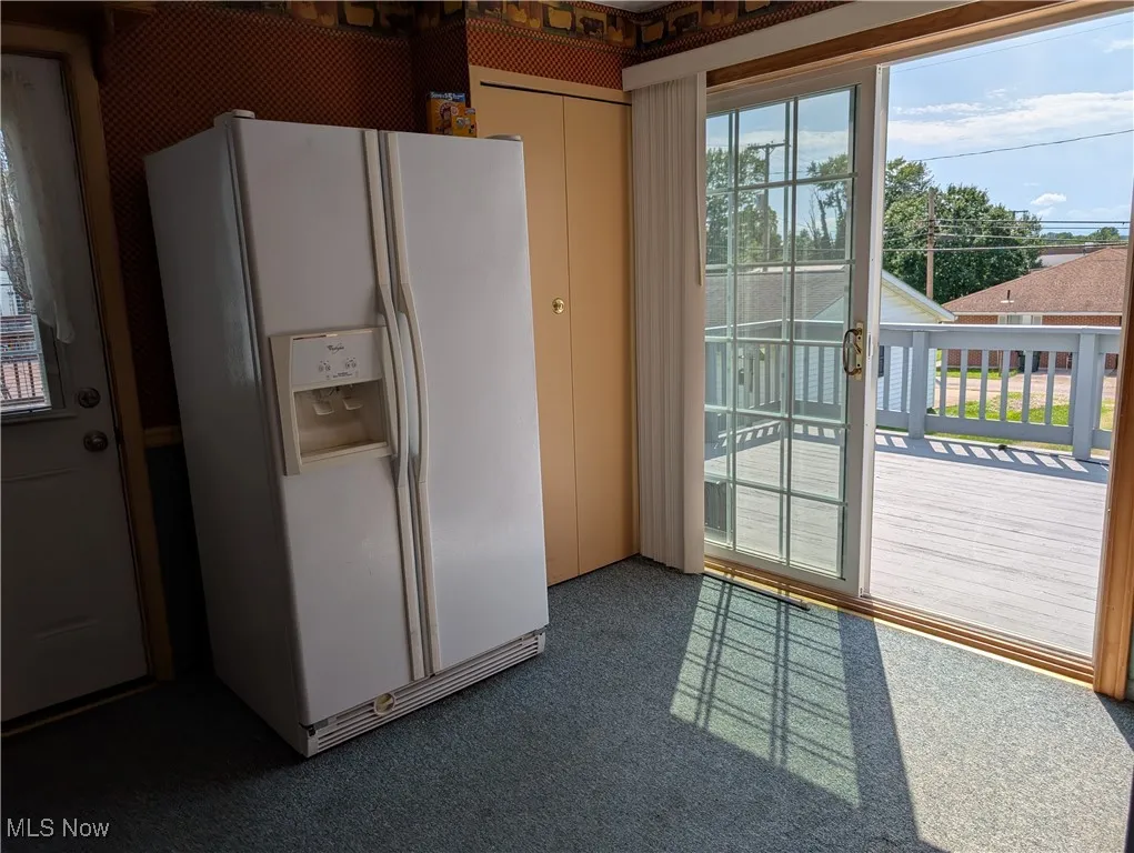 Kitchen with entry to the back deck