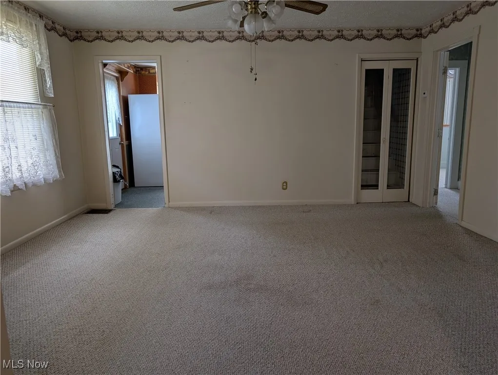 Dining room with entry to the Kitchen and upstairs and hallway