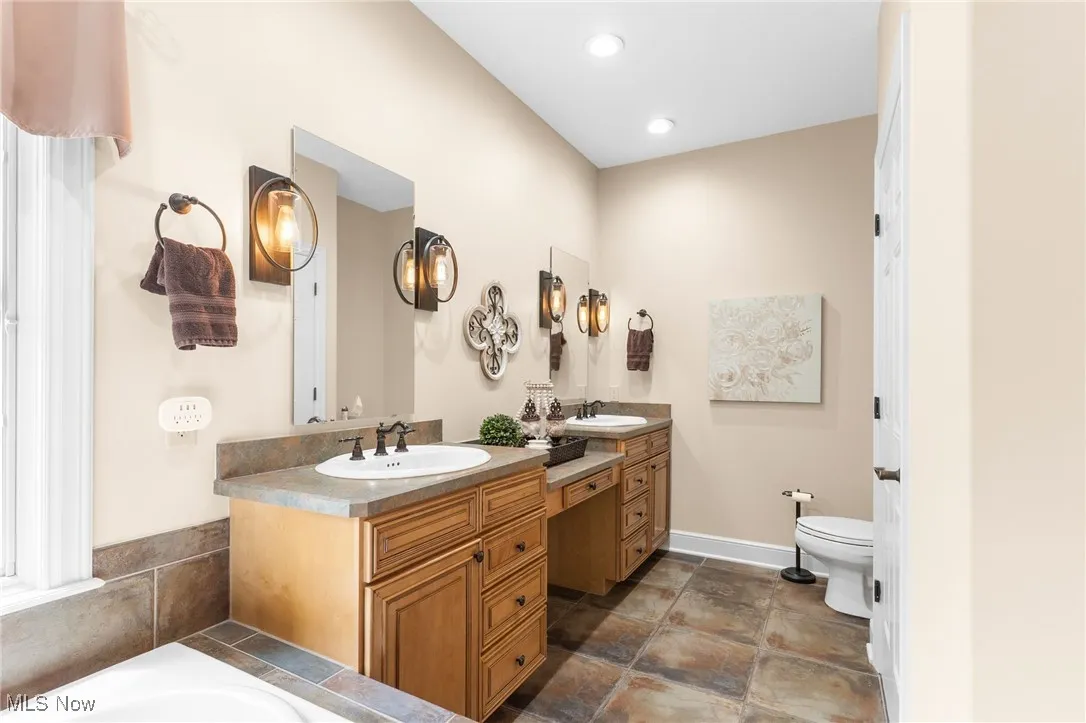 Primary Bath featuring double vanity