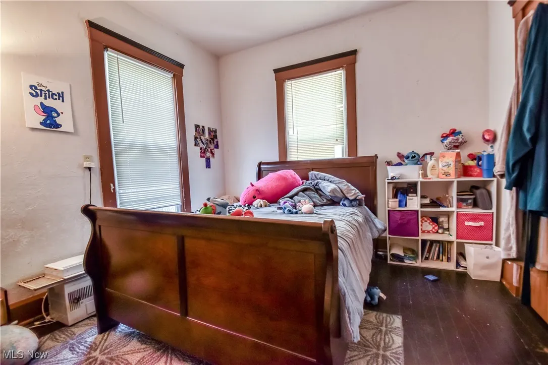 Bedroom featuring wood finished floors