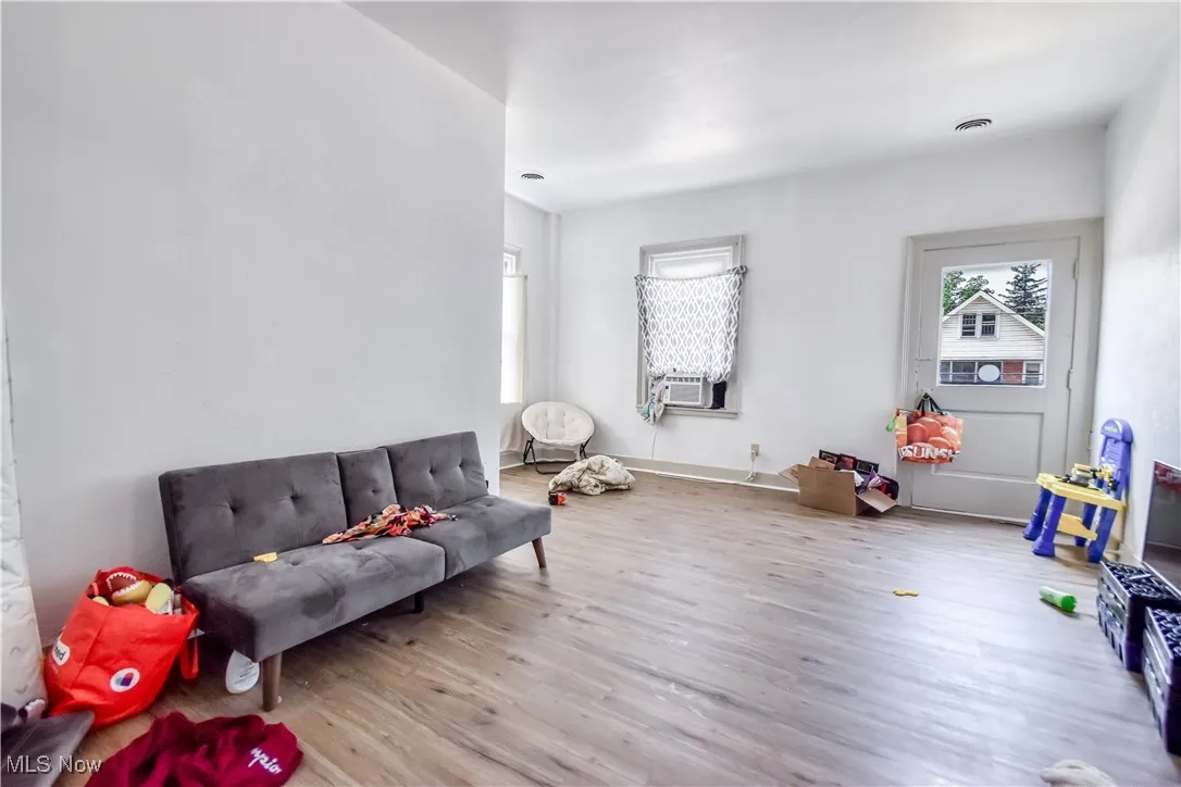 Game room with wood finished floors