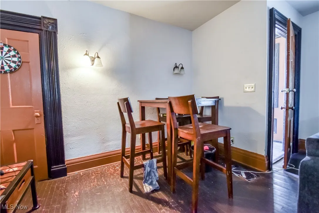 Dining area featuring hardwood / wood-style floors and baseboards