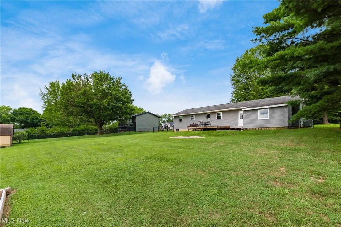View of yard featuring a deck