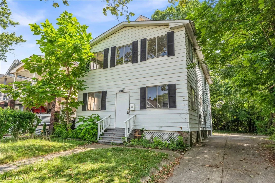 View of front of home featuring driveway