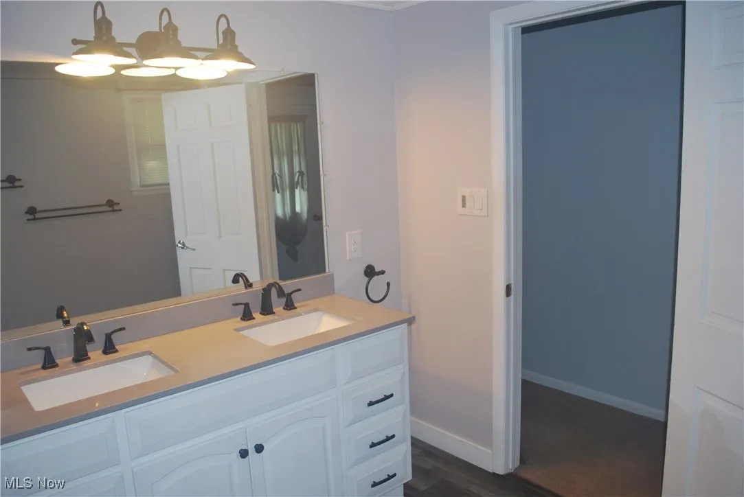 Bathroom featuring double vanity