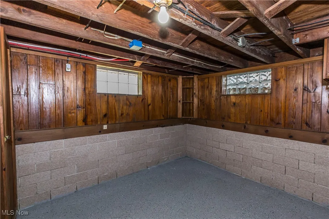 Below grade area with concrete block wall