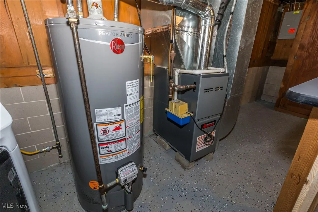 Utilities featuring gas water heater and heating unit
