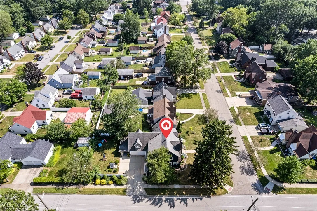 View of property location with nearby suburban area