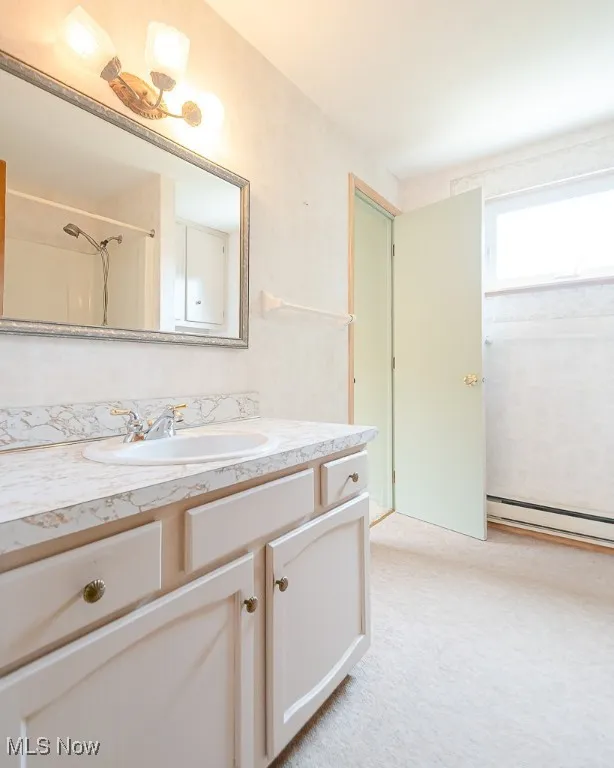 Full bathroom featuring vanity