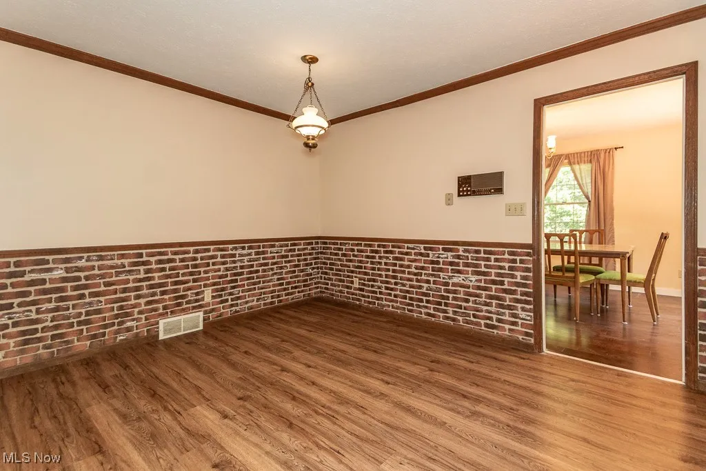 Seller planned on opening up the wall to the Dining Area