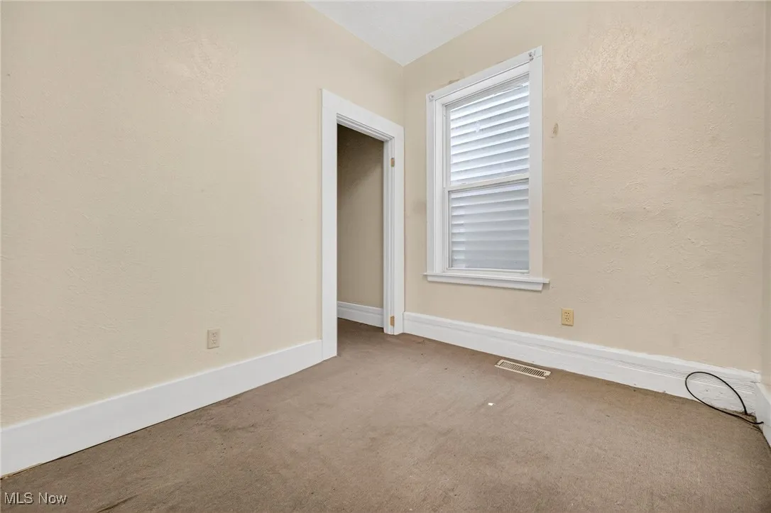 first floor bedroom off dining room