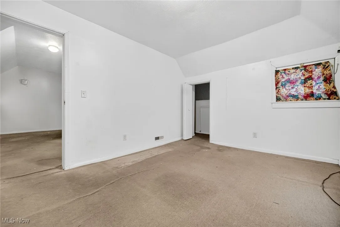 2nd floor bedroom with owner's suite potential - unfinished space accessed through the closet