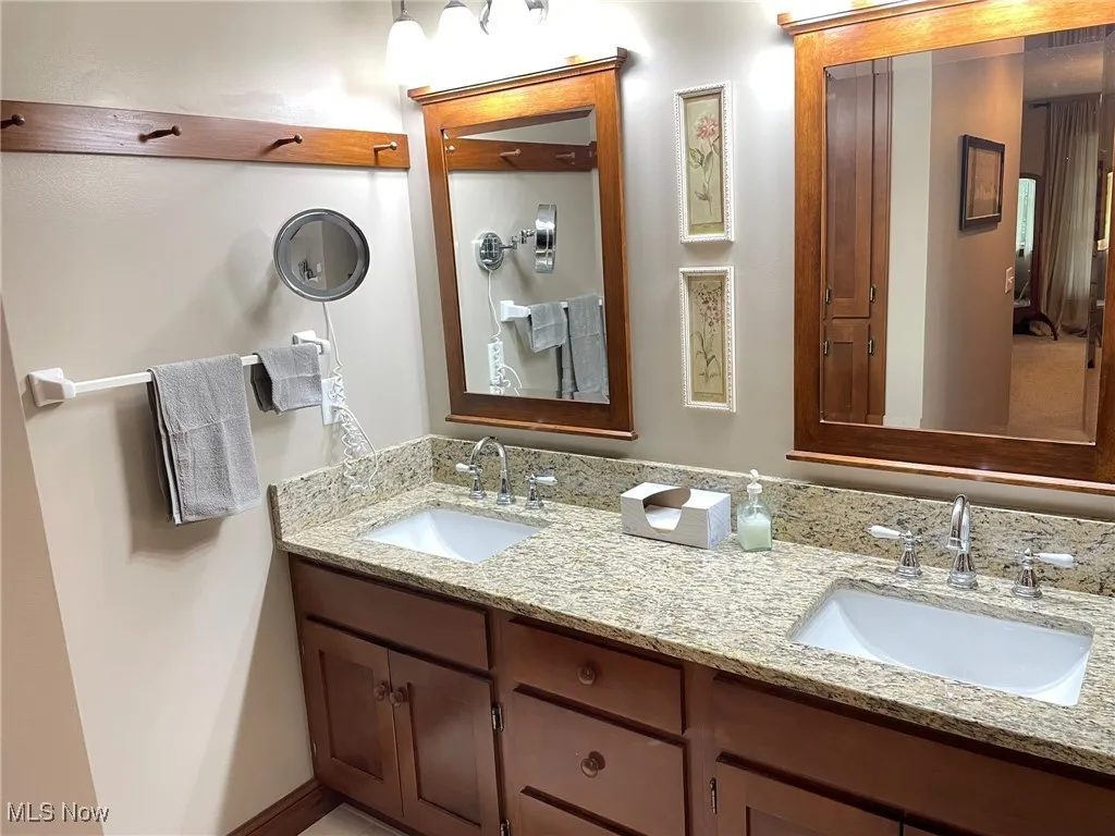 Bathroom featuring double vanity