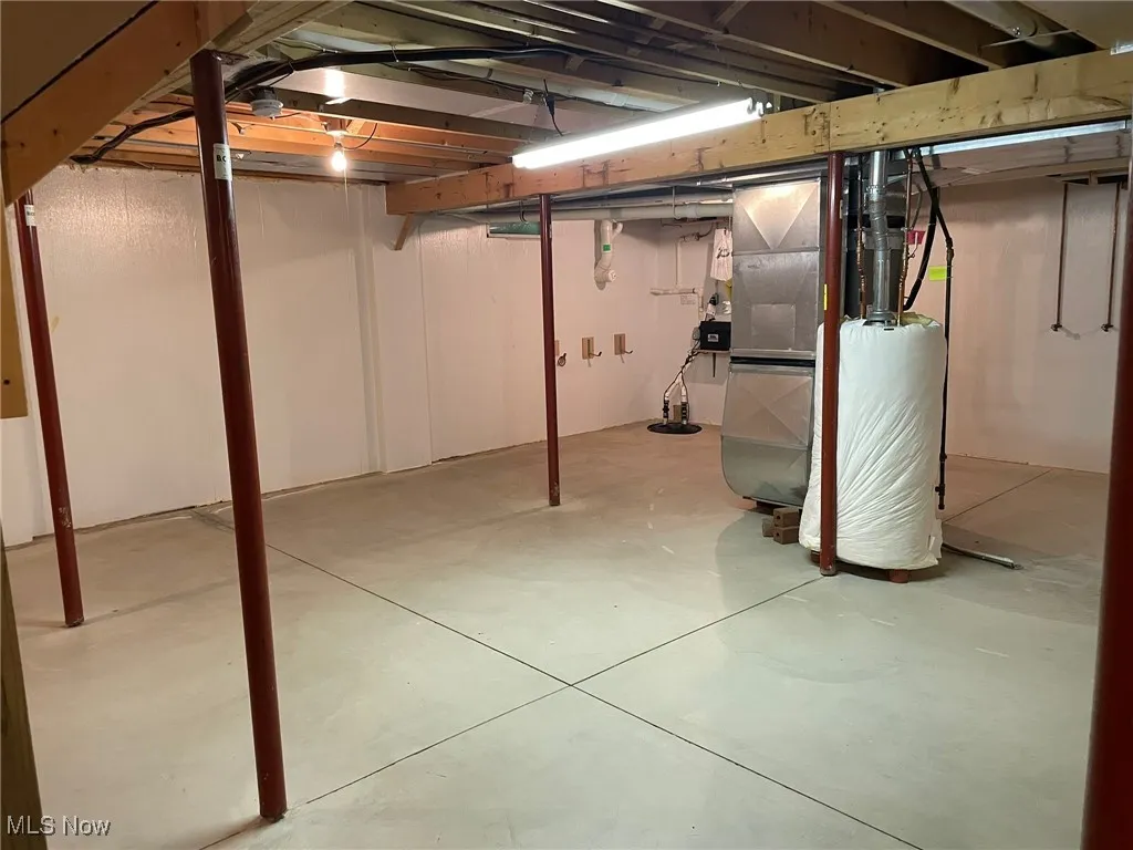 Unfinished basement with water heater