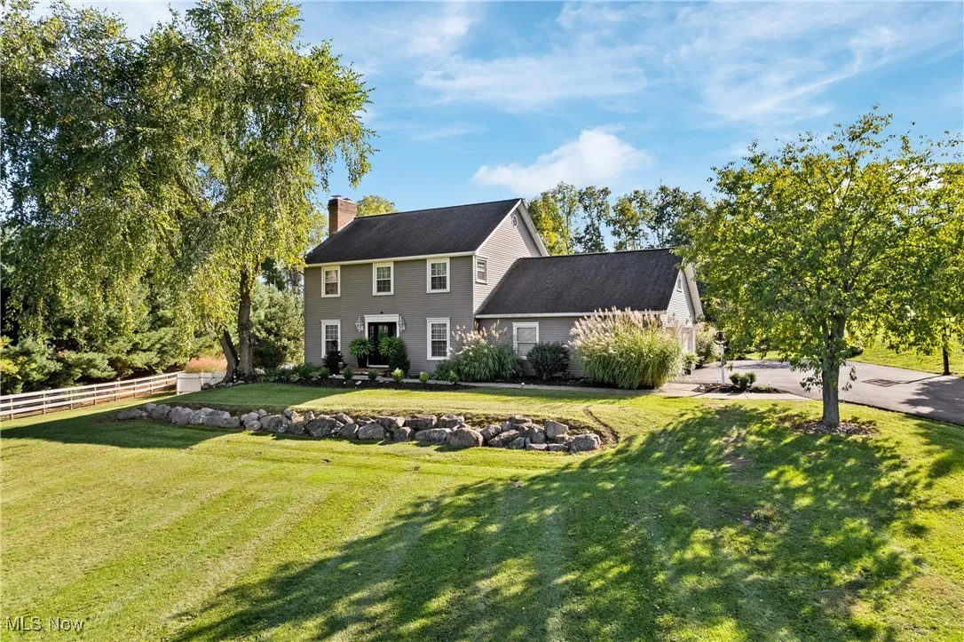 Back of property featuring a chimney