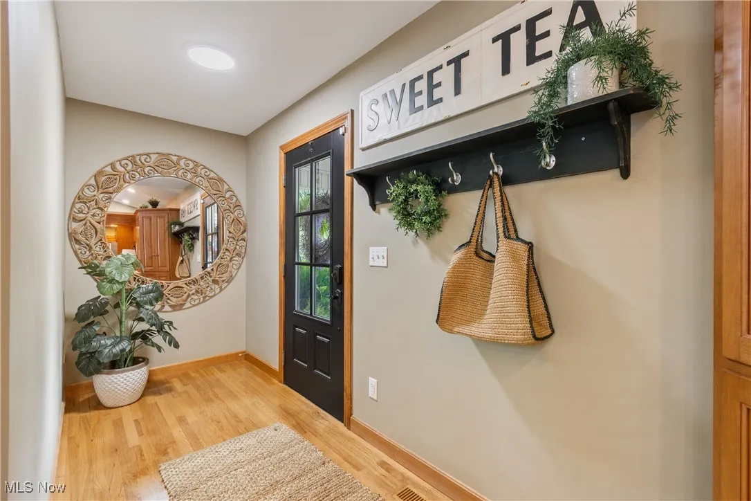 Entryway featuring wood finished floors