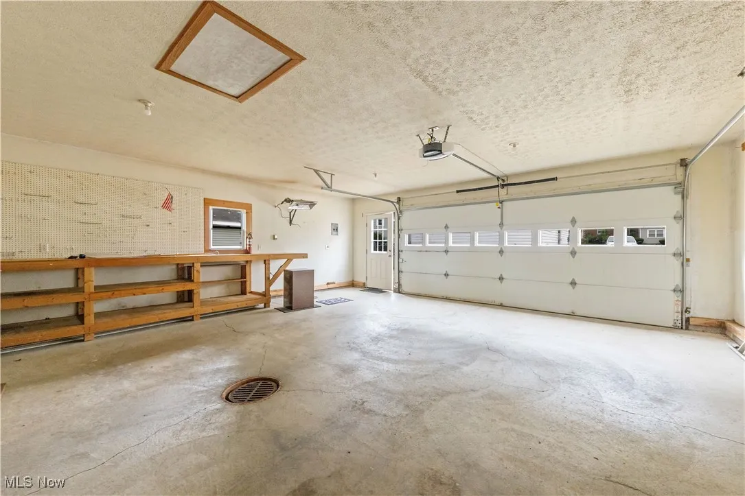 Garage featuring a workshop area