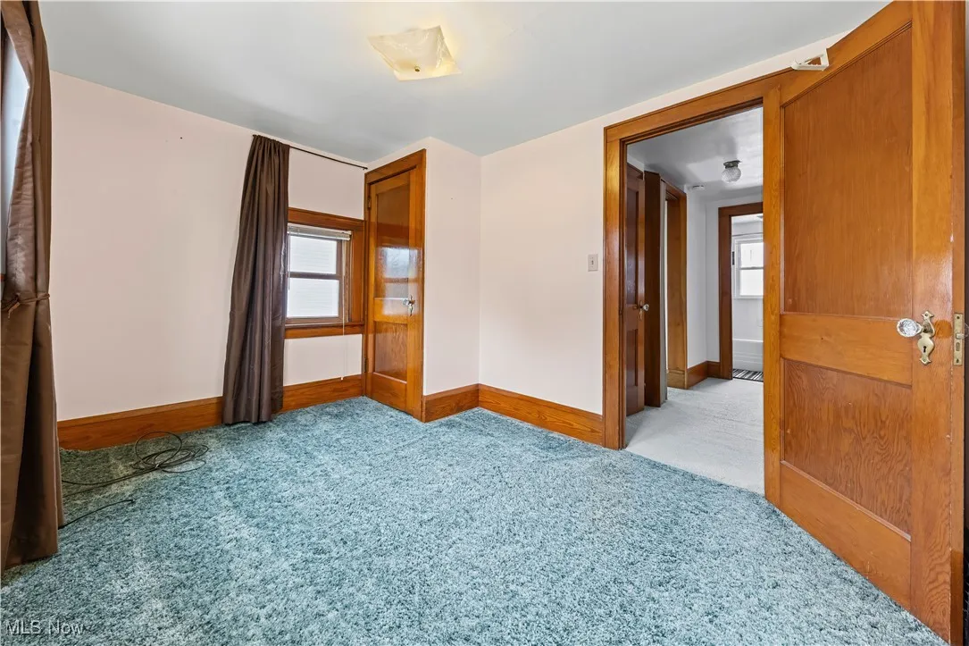 Spare room with carpet flooring