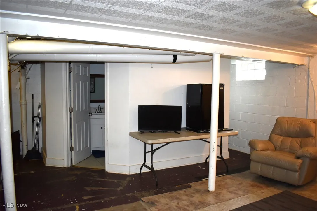 Below grade area with concrete block wall