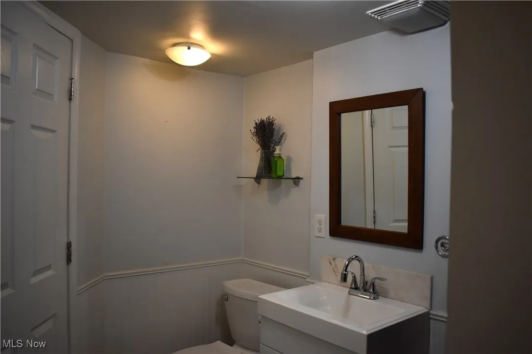 Full bath featuring vanity