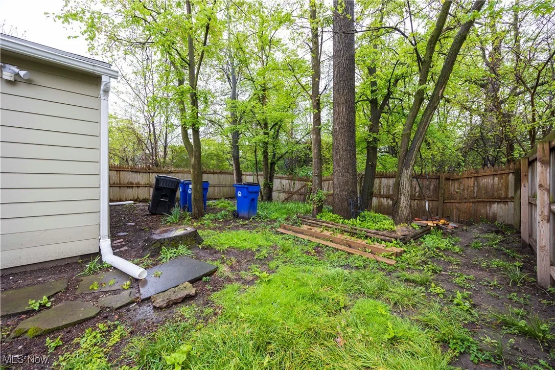 View of fenced backyard