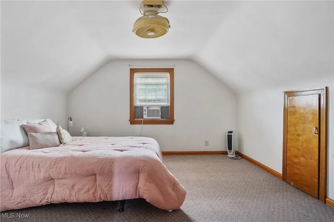 Captive bedroom (not counted in listing) with large closet and dormer storage