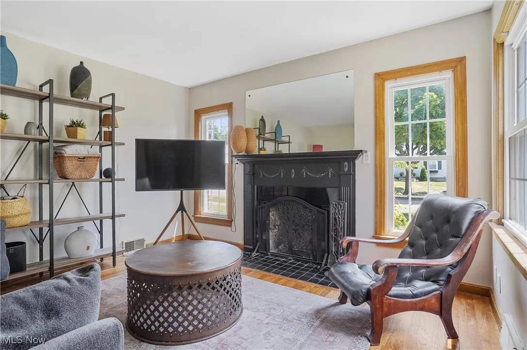 Living room with plenty of natural light and hardwood floors