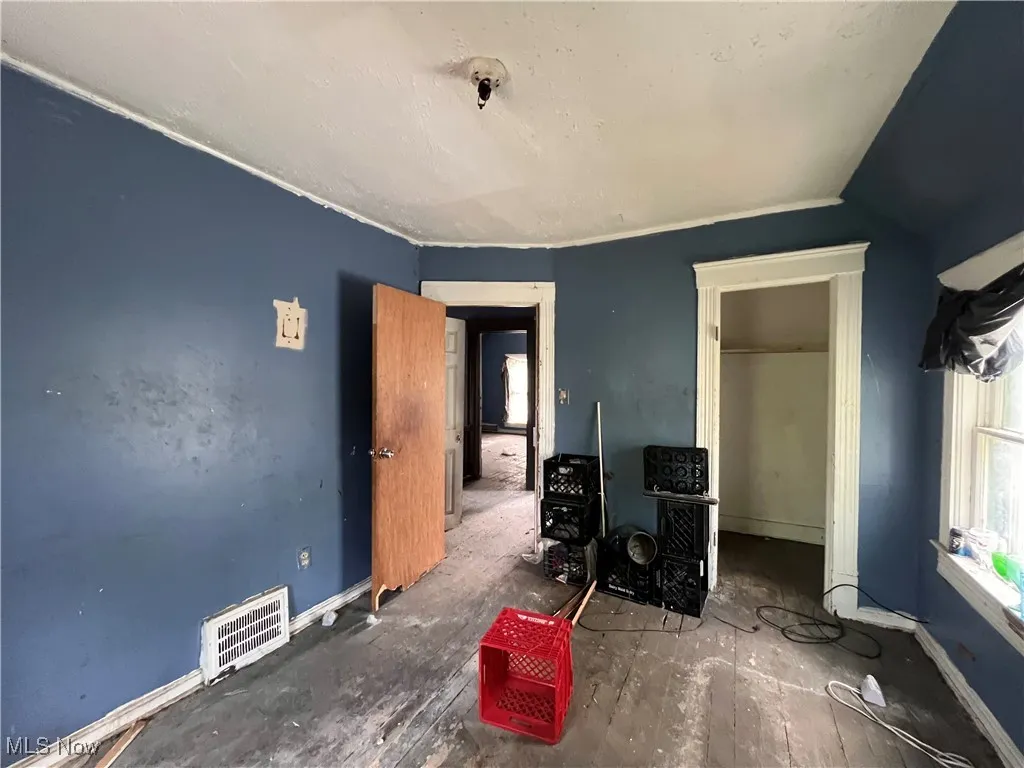 Bedroom with baseboards
