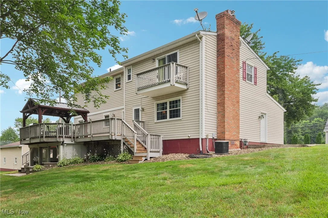 Rear view of side / back of the home