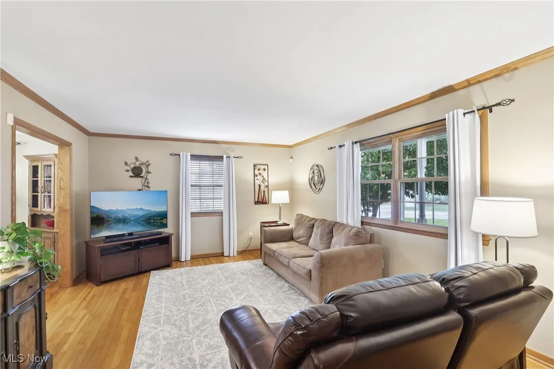 Living area featuring wood flooring