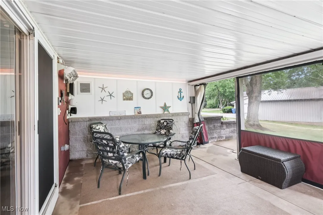 Lower level walk-out to heated 4 season / sun room